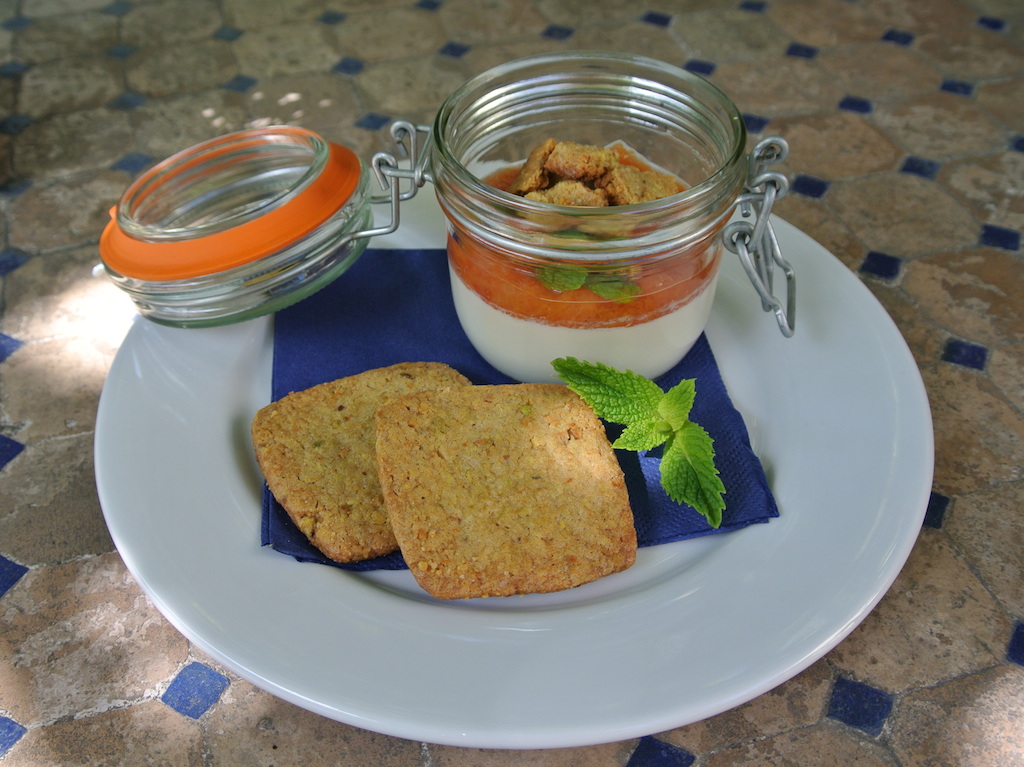Panna cotta with peach compote and pistachio shortbread cookies