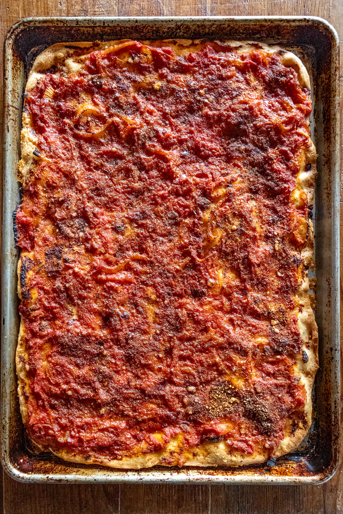 Sfincione (Sicilian New Years Pizza with Bread Crumbs, Onions, and